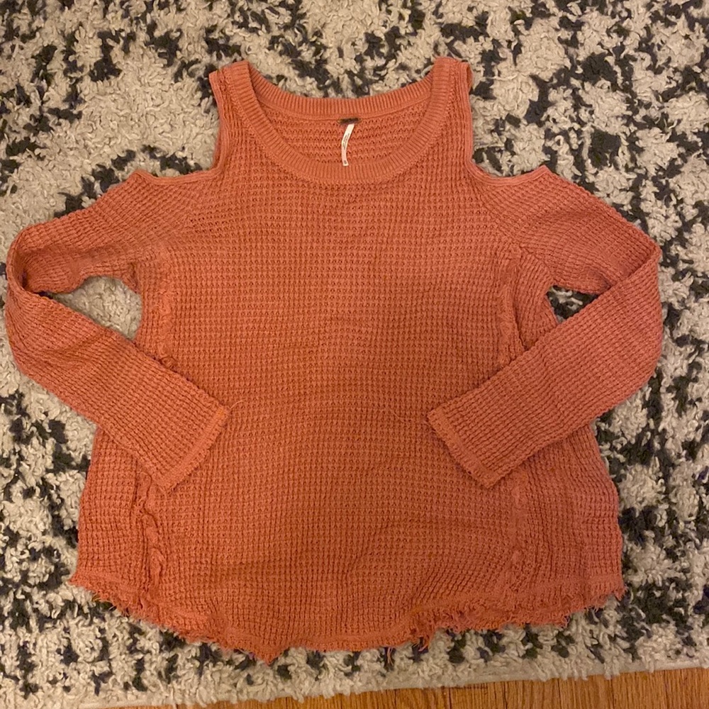 Peachy coral open shoulder free people sweater as seen on selena Gomez